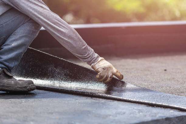 Professional Emergency Waterproofing technician working in Fayetteville, NC